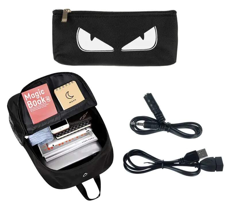 KRUZZEL SVÍTÍCÍ BATOH S USB, REFLEXNÍMI PRVKY A PENÁLEM